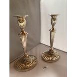 Pair of silver candlesticks (filled). Hallmark London 1977. 11.5” (29cm) high. Good condition.