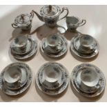 21 piece Noritake Violette tea set, including 6 cups, 6 saucers, 6 side plates, teapot, sugar bowl