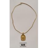 Gold plated dress necklace, length 15” (39cm) and medallion, length 1” (2.5cm)