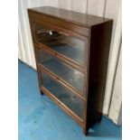 Globe Wernicke style bookcase, 3 heights. Some wear and scratches on front and top and damage to