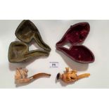 2 Meerschaum cased pipes – 1 with head and amber mouthpiece 4” (10cm) long, (slight damage to