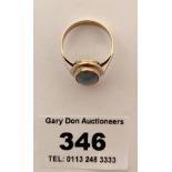 9k gold and oval stone ring, w: 3.3 gms, size O