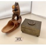 Small Black Forest style carved wooden bear on shoe carrying detachable torch. 5” (13cm) high x 5.5”