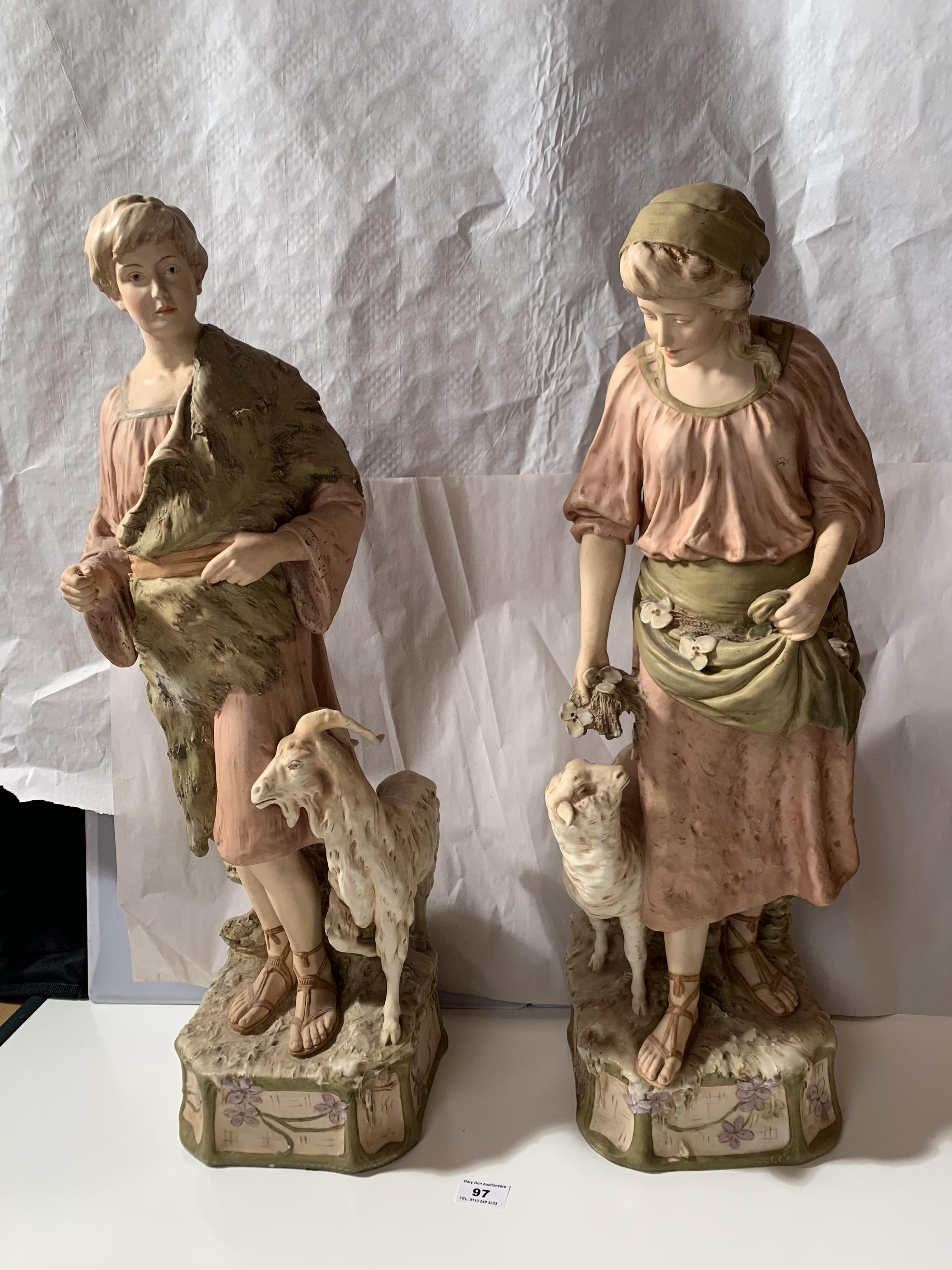 Large pair of Royal Dux figures, boy and girl goatherds. Numbered 1101 and 1102. Boy is 26” (66cm)
