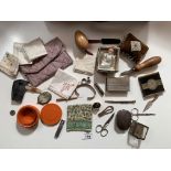 Small vintage leather suitcase with contents – handkerchieves, holders, scissors, sewing implements,