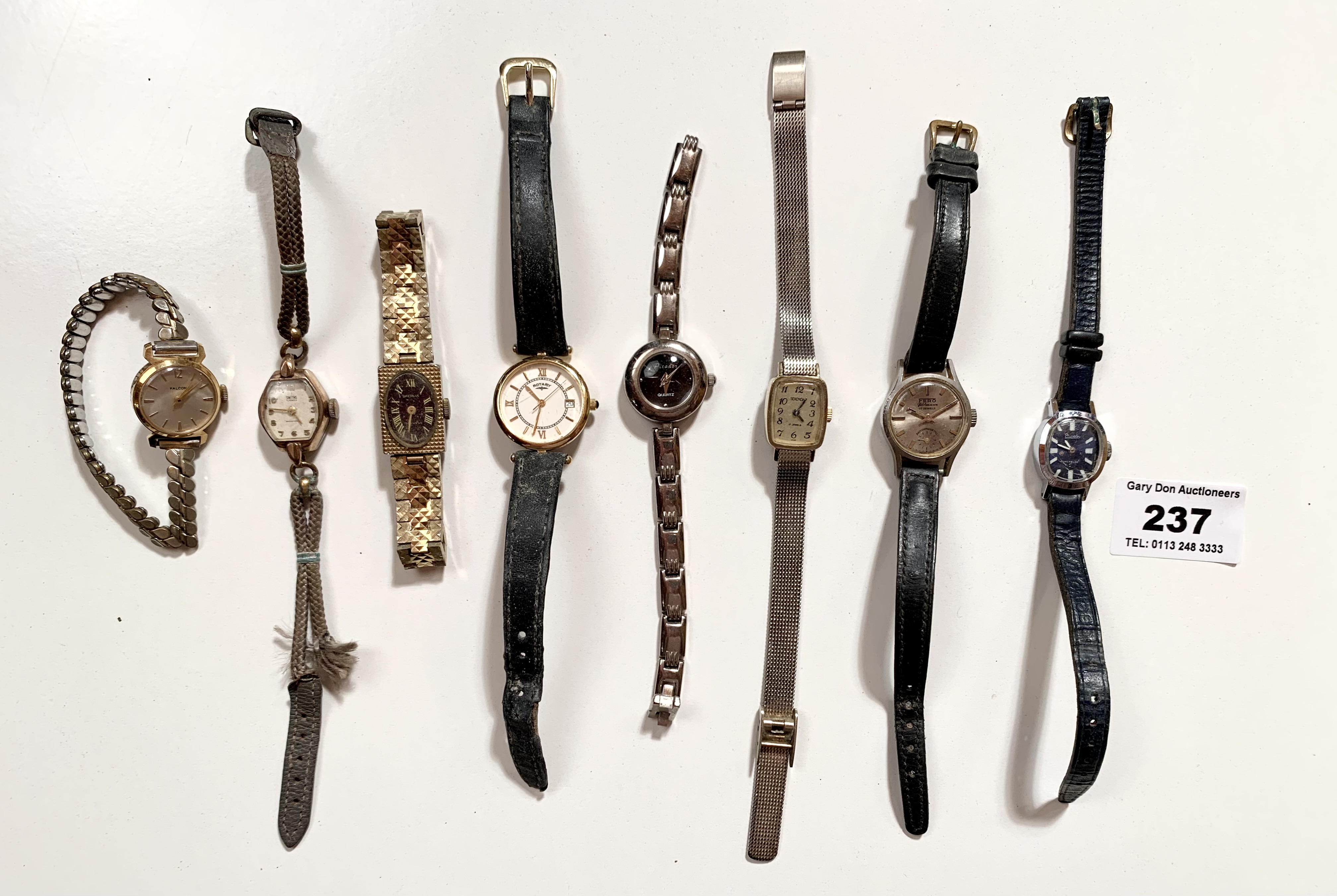 8 mixed ladies watches, untested.