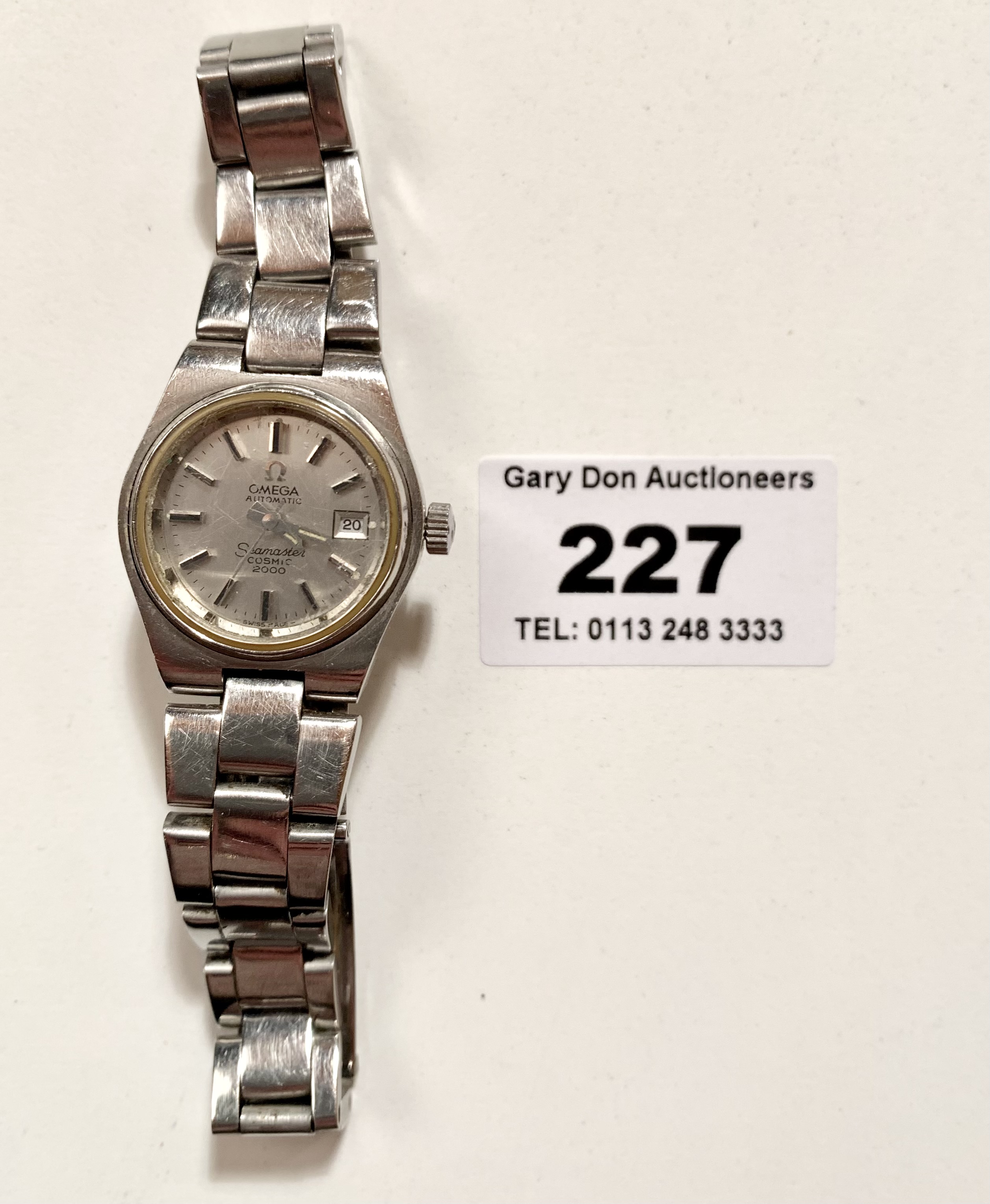 Omega Automatic Seamaster Cosmic 2000 ladies watch on stainless steel bracelet. Winder moves but