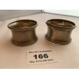 Pair of silver napkin rings. Hallmark Birmingham 1942. Total W: 1.02 tozs. 1 dented