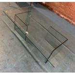 Glass designer coffee table in 3 sections. 2 chips to base and 1 chip on top. 28”(71cm) deep x 14.