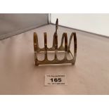 Small silver toastrack. Hallmark Sheffield 1940. 3” (7.5cm) long x 3.5” (8.5cm) high. W: 1.7 tozs.