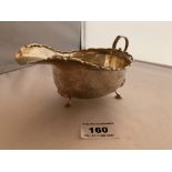 Silver sauce boat. Hallmark Birmingham 1911. 6” (15cm) long x 2.5” (6cm) high. W: 3.16 tozs.