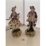 Pair of German Martha Dudich Dresden style figures dressed as lady and gentleman. 10” (25.5cm) high.