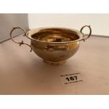 Small silver 2 handled bowl. Hallmark Birmingham 1910. 3.75” (9cm) diameter. W: 1.97 tozs.