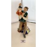 Royal Doulton figure “The Puppetmaker” HN 2253. Small chip on base
