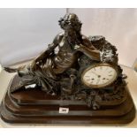 Bronze figure mantle clock on wooden plinth, marked Roblin A Paris, length of clock 17” (43cm) and