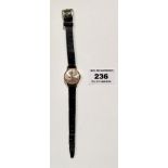 Tissot ladies watch on leather strap in Tissot case, running