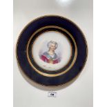 Handpainted continental picture plate of Marie Antoinette. 9.25” (24cm) diameter. Some wear to
