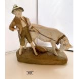 Royal Dux figure of boy with calf. 11” (28cm) high x 11” (28cm) long. Possible minor damage to top