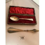 Cased silver spoon, Hallmark Sheffield 1897. W: 1 toz. And silver handled shoe horn