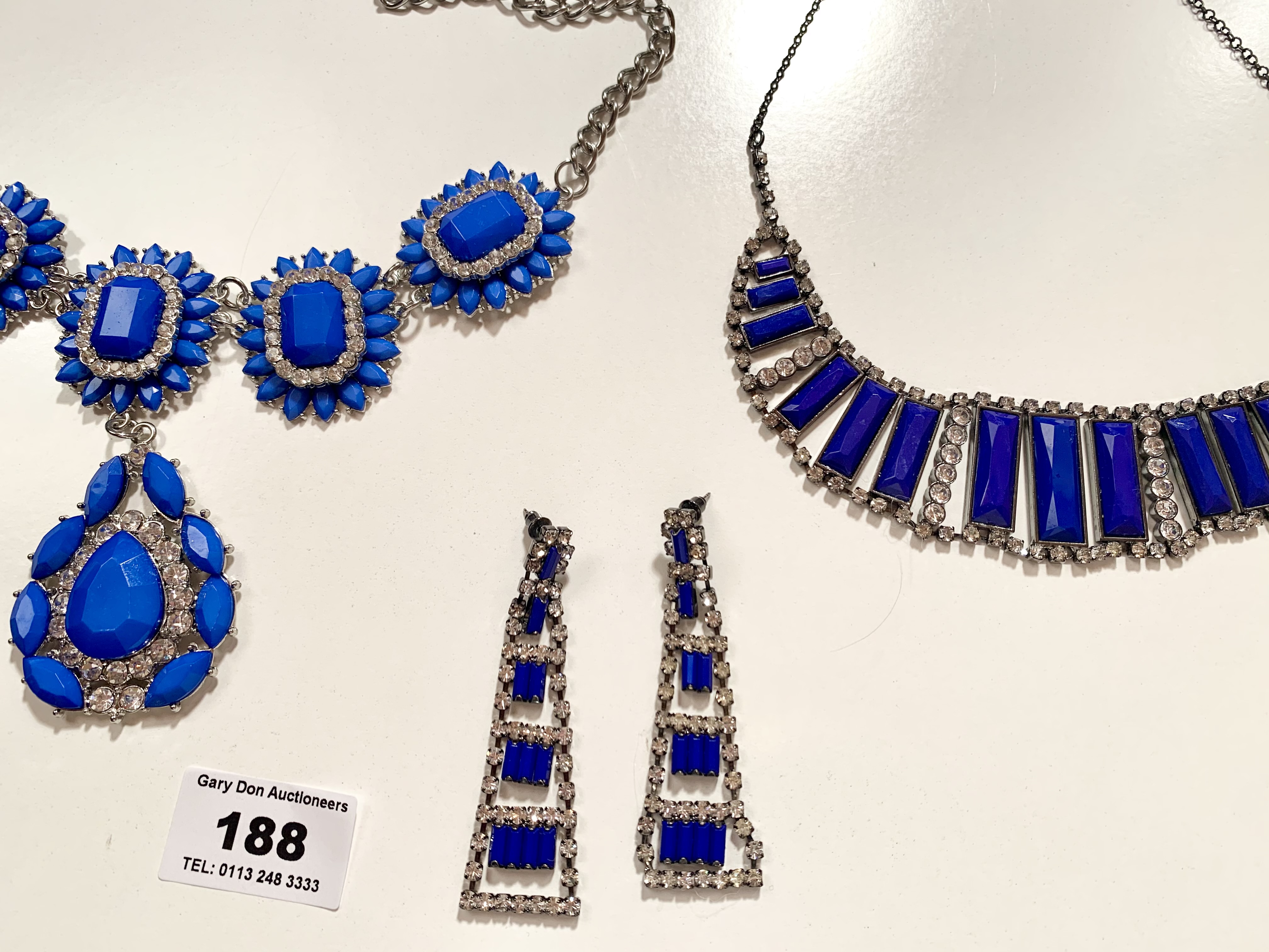 2 blue dress necklaces, pair of blue dress earrings and blue dress bracelet - Image 2 of 2