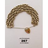 9k gold gate bracelet with heart lock, W: 28.9 gms, length 7” (18cm)