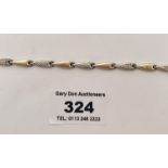 9k gold banded and silver bracelet, total w:3.8 gms, length 7.5” (19cm)