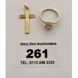 9k gold cross pendant and 9k gold and white stone ring, size N, total w: 2.7gms