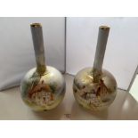 Large pair of unmarked landscape bulbous vases, 15” (38cm) high. Some crazing, paint flecks and wear