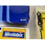 2 boxed Weetabix trucks