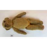 Antique teddy bear 15” long.
