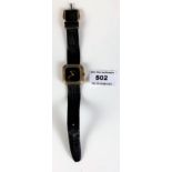 Silver Roy King watch with black leather strap, running