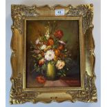 Oil painting “A Vase of Flowers” by Teri Van Hagen, 7.75” x 9.75”, frame 11.75” x 13.75”. Gallery