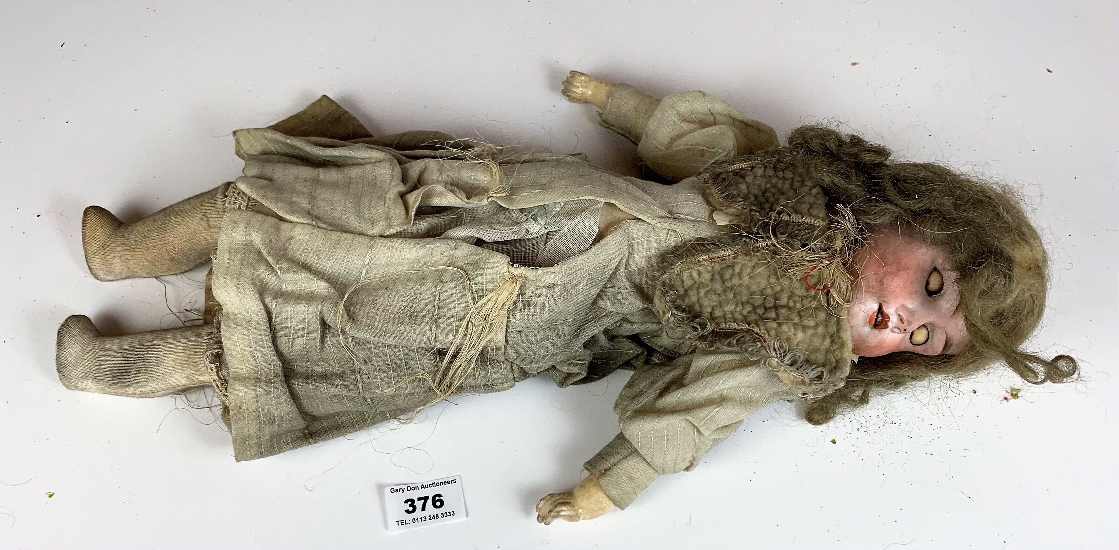 Antique bisque German doll, 17” long