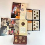 2 Britain’s First Decimal Coins sets, 1997 Golden Wedding Commemorative Crown and 1965 set of