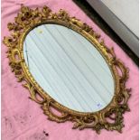 Oval mirror. 38” x 22”