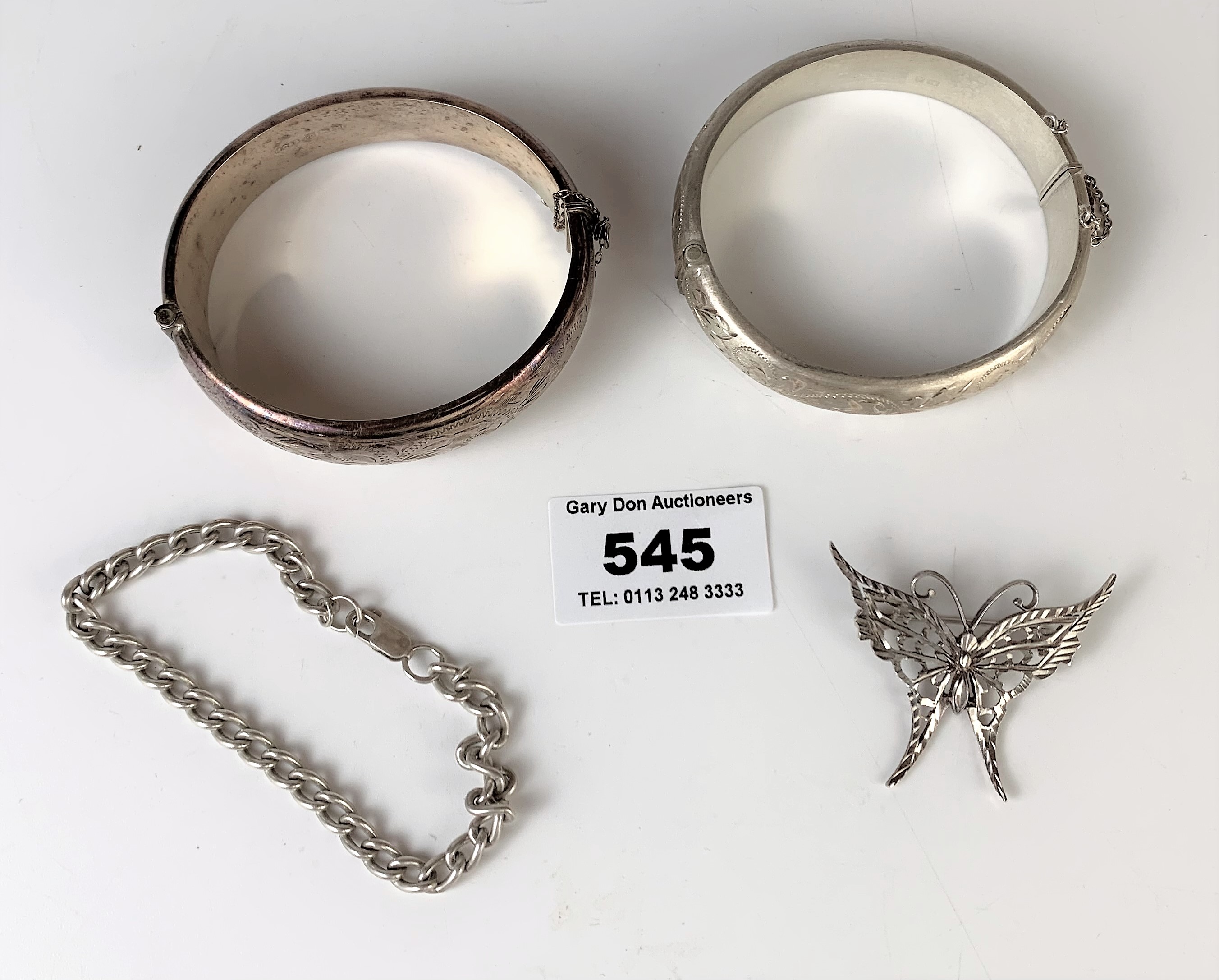 2 silver bangles, silver bracelet and silver butterfly brooch, total w: 1.9 ozt - Image 2 of 5