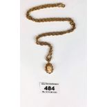 9k gold necklace, 24” length and 9k rimmed cameo pendant .75” length, total w: 16.3 gms