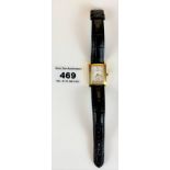 18k gold Longines ladies watch with leather strap. Glass cracked. Not running