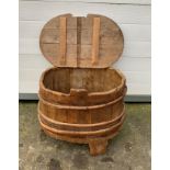 Antique lidded barrel. 33” wide, 22” deep, 30” high. General wear.