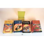 Boxed set of 4 Harry Potter paperback books – The Philosopher’s Stone, The Chamber of Secrets, The