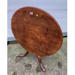 Mahogany tilt top antique tripod table. 19.5” high (35” tilted), 29” deep, 29” deep. General wear.