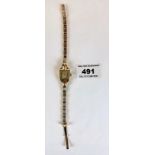 9k gold Felca ladies watch on 9k gold bracelet. Total w: 13 gms. Running