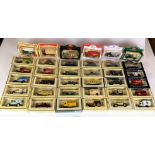 29 assorted boxed Days Gone model vehicles, 3 Ringtons Tea vehicles and 4 assorted commemorative