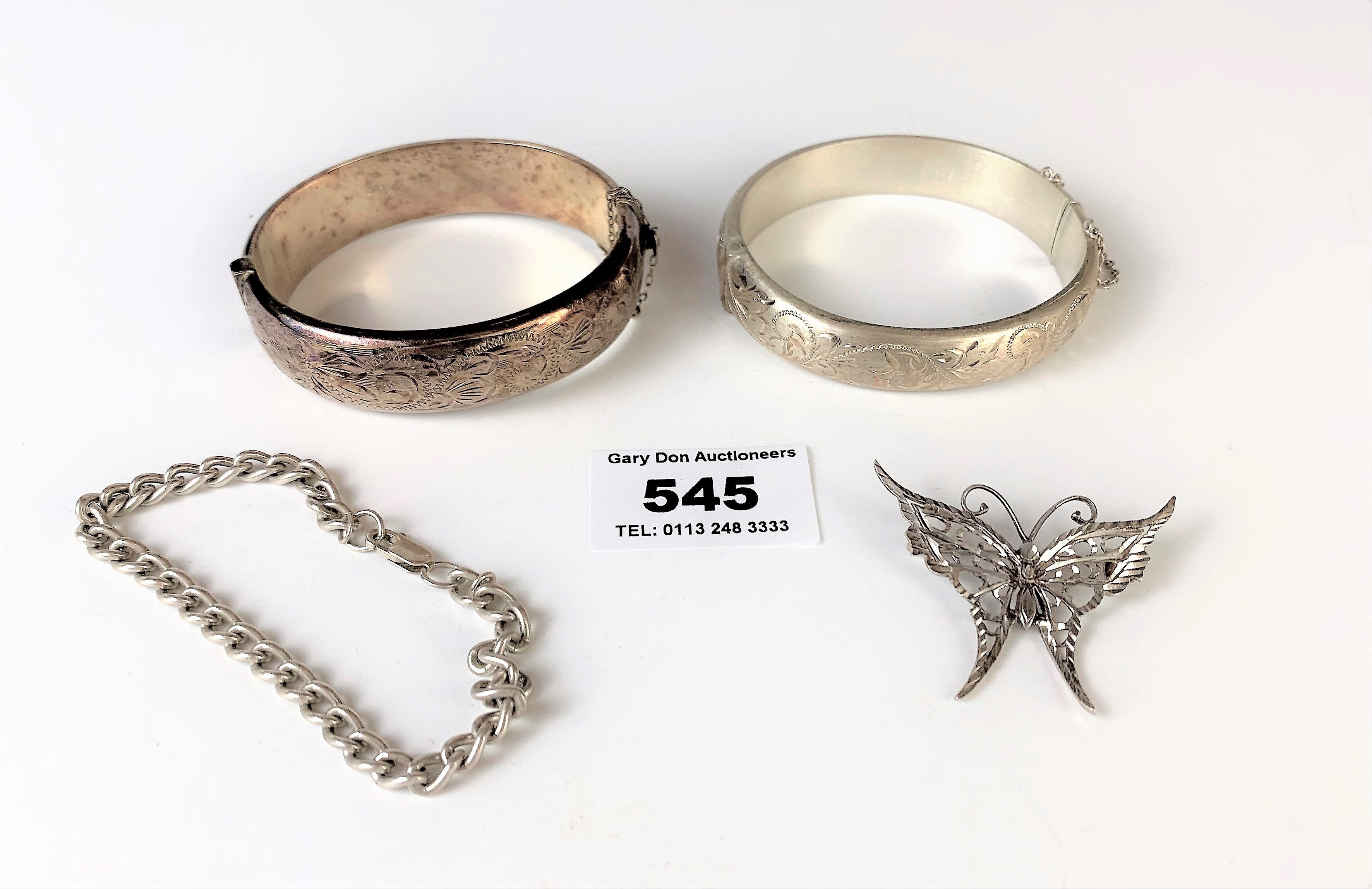 2 silver bangles, silver bracelet and silver butterfly brooch, total w: 1.9 ozt