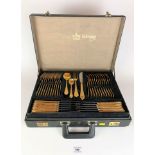 Cased Bestecke Solingen gold plated canteen of cutlery, 71 piece