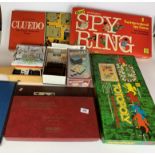 Cluedo, Totopoly, Spy Ring, Boggle, Scrabble, 4 chess boards, dominoes and tin