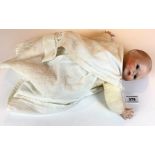 Vernon Seeley 1977 porcelain head baby doll. 14” long