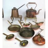 Set of copper pans, 2 trivets, copper kettle, long handled jug and flask