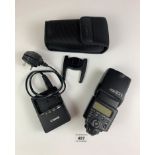 Canon Speedlite 430EXII in case with Canon battery charger LC-E6E