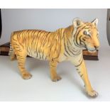 Franklin Mint tiger “On the Prowl” on wooden plinth 25”long x 8” wide (not perfect) and Franklin